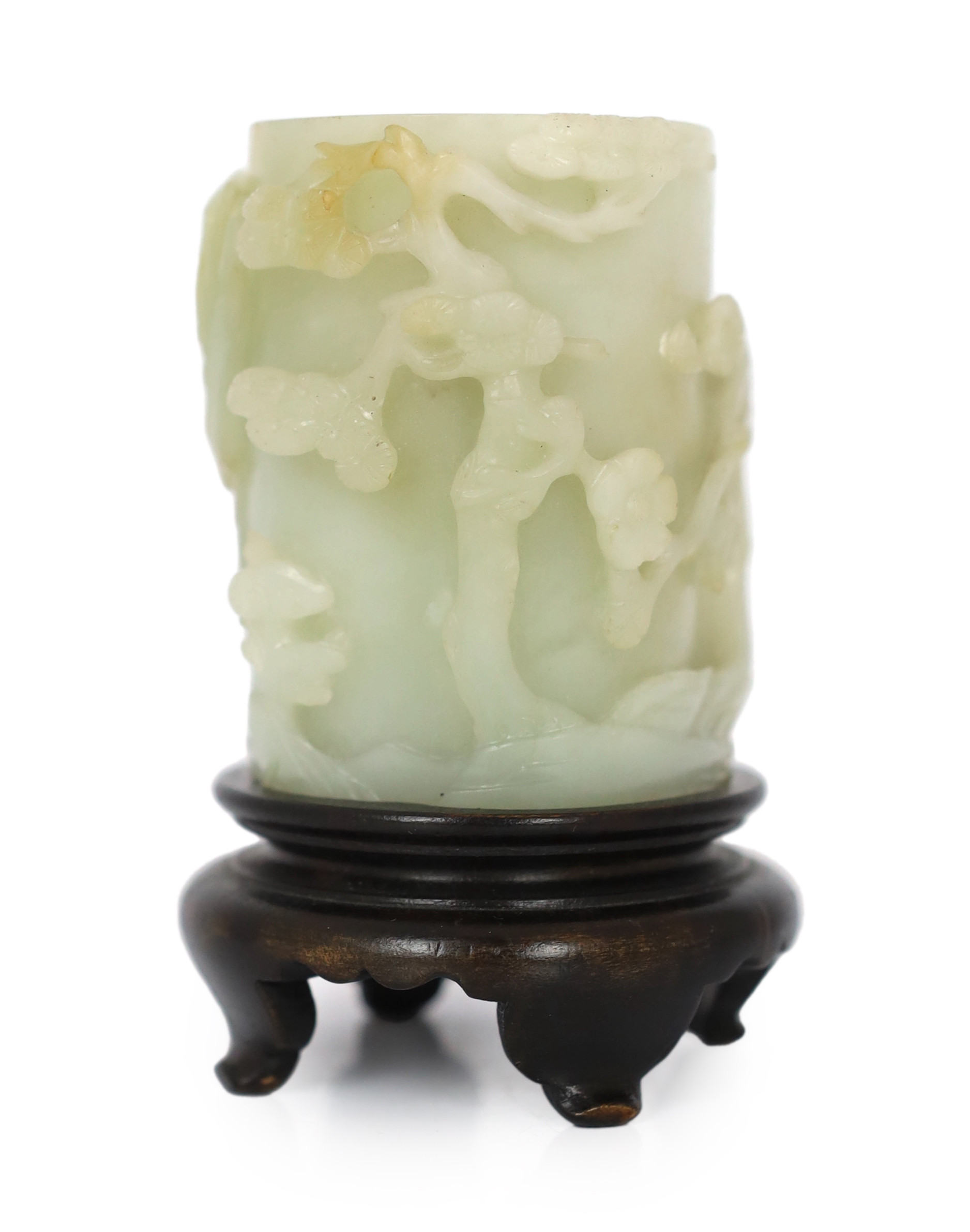 A Chinese pale celadon and russet jade brush pot, bitong, 18th century